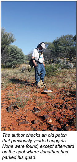 The author detecting an old nugget patch in Western Australia
